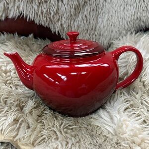 Red Le Creuset Ceramic Teapot with Glossy Finish